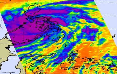 NASA sees Super-Typhoon Haiyan maintain strength crossing Philippines