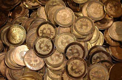 A pile of Bitcoins sit in a box ready to be minted by Software engineer Mike Caldwell in his shop on April 26, 2013 in Sandy, Ut