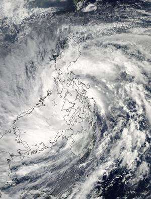 NASA sees Super-Typhoon Haiyan maintain strength crossing Philippines