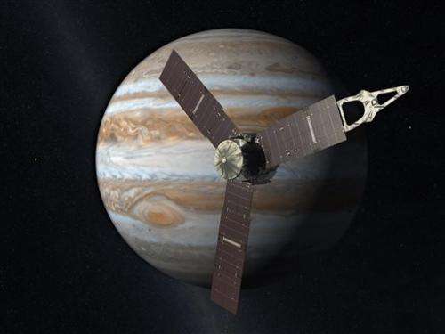NASA spacecraft zips by Earth en route to Jupiter