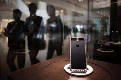 A $25,760 (200,000 HKD) custom-built iPhone 5 with a rose gold dressing, on sale in Hong Kong on April 23, 2013