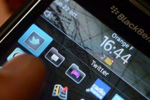 A blackberry phone showing a page of the micro-blogging site Twitter on October 22, 2012 in Rennes, France.