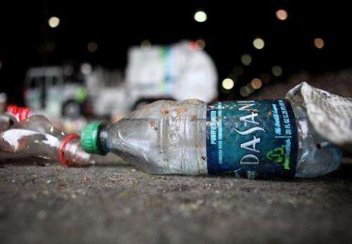 A bottle of Dasani water sits on the floor of a recycling facility in San Francisco, California, on March 15, 2011