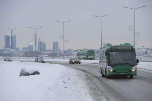 A bus plies a frozen Tallinn road on January 17, 2013