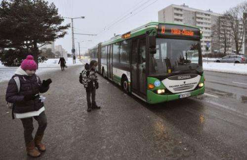 A bus stops for passengers in Tallinn on January 9, 2013