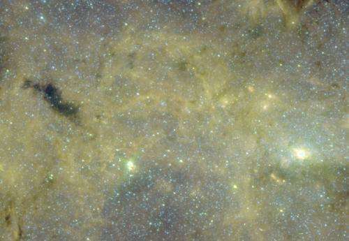 A cloudy mystery: Puzzling cloud near galaxy's center may hold clues to how stars are born