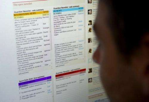 A computer screen shows the Guardian's "newslist" on the British newspaper's website on November 10, 2011