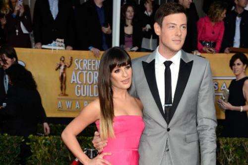 Actress Lea Michele (L) and actor Cory Monteith arrive at the 19th Annual Screen Actors Guild Awards held at The Shrine Auditori