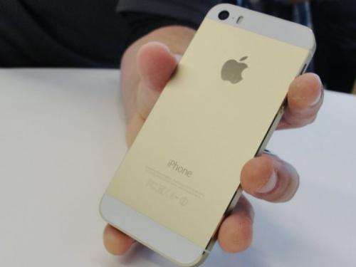 A gold iPhone 5S at Apple's headquarters in Cupertino, California on September 10, 2013
