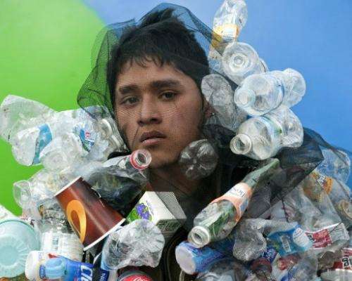 A Greenpeace activist demonstrates in Mexico City on December 3, 2010