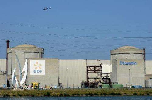 A helicopter flies over Areva's Tricastin nuclear power plant in Pierrelatte, north of Marseille, on July 15, 2013