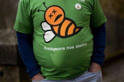 A man in Berne on February 28, 2013 wears a T-shirt reading in French &quot;Protect our bees&quot;