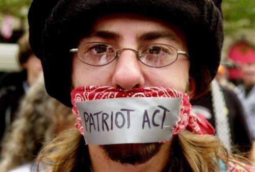 A man protests the Patriot Act on July 29, 2004 in Boston, Massachusetts