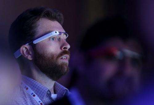 A man wearing Google Glass eyewear attends the Google I/O developers conference in California on May 15, 2013