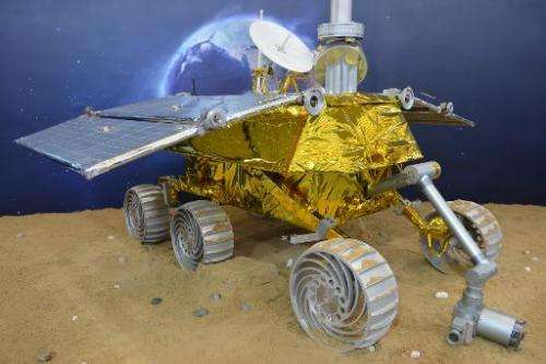 A model of a lunar rover that will explore the moon's surface in an upcoming space mission is seen on display at the China Inter