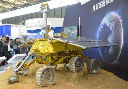 A model of China's lunar rover known as The Yutu, or Jade Rabbit is put on display at the China International Industry Fair 2013