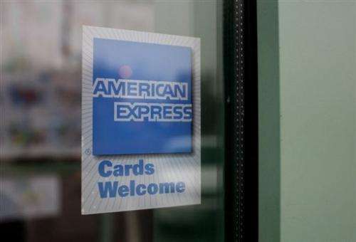 An  American Express sign is shown in the window of a restaurant November 11, 2008 in Des Plaines, Illinois