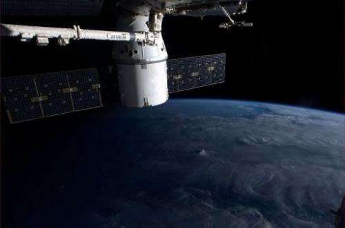 A NASA image taken on the International Space Station shows part of the ISS and Earth, on March 9, 2013