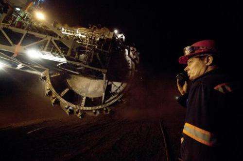 An excavator works in a open-cast mine in Belchatow, central Poland, on September 28, 2011