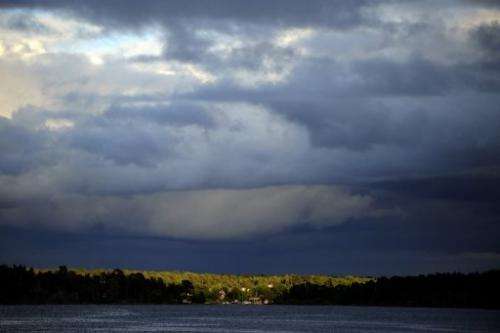 An island near Stockholm is shown lighted by a sunrise on June 15, 2009