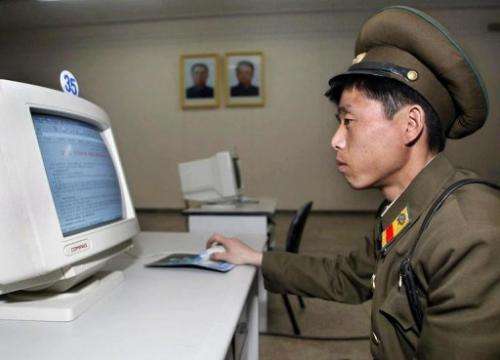 A North Korean soldier, seen using a computer, in Pyongyang, on March 28, 2002