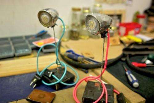 A pair of lamps made with bicycle parts are on show at the workshop of Upcycle on May 17, 2013 in Delft