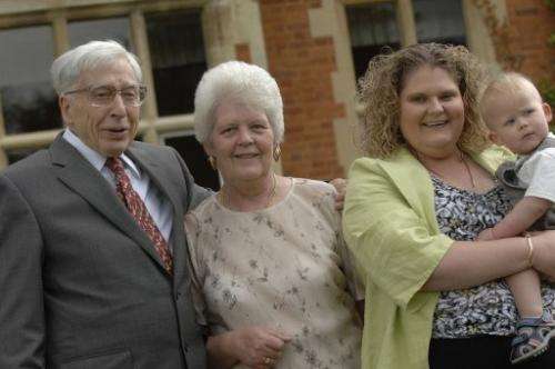 A picture from July 12, 2008 of the world's first IVF baby Louise Brown (2nd R) and Robert Edwards in Bourn, England