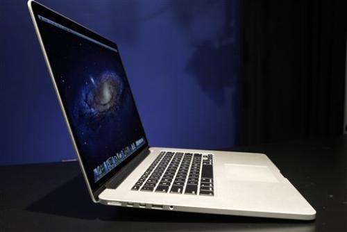 Apple cuts MacBook Pro price, updates processors