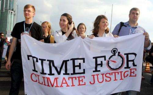 A rally in Doha on December 1, 2012 to demand urgent action on climate change