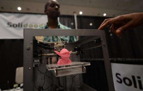 A sample object, printed with a 3D printer, is on display during an exhibition in New York on April 22, 2013