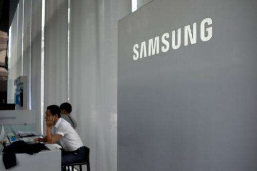A Samsung logo is displayed at a showroom in Seoul on July 5, 2013