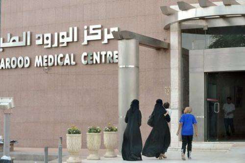 A Saudi family arrive at a hospital in the center of the capital Riyadh, on May 14, 2013
