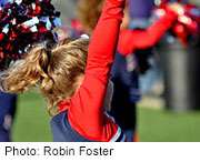 As cheerleading evolves, injuries mount