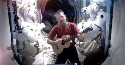 Astronaut makes music video aboard space station