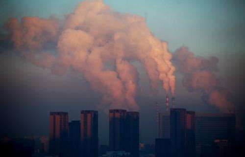 A thermal power plant discharges heavy smog into the air in Changchun, China, on January 22, 2013