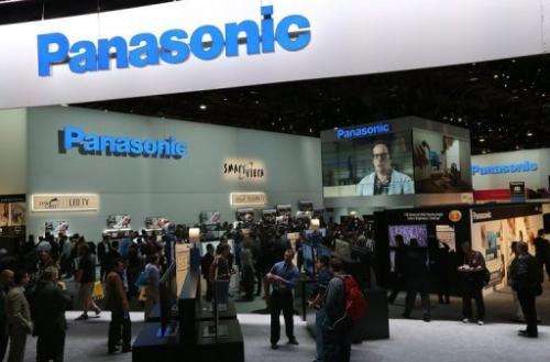 Attendees walk through the Panasonic booth during the 2013 International CES in Las Vegas on January 8, 2013