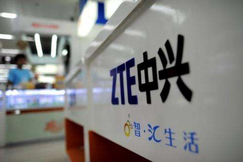 A ZTE logo is diplayed on a sales counter in Wuhan, central China's Hubei province on October 8, 2012