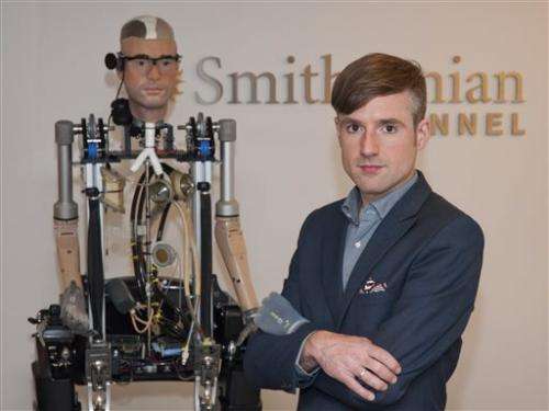 'Bionic man' walks, breathes with artificial parts