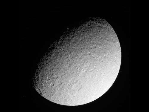 Cassini returns images of battered Saturn Moon