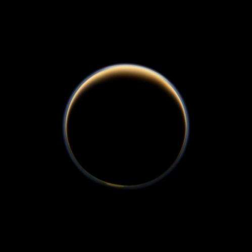 Cassini sees precursors to aerosol haze on Titan