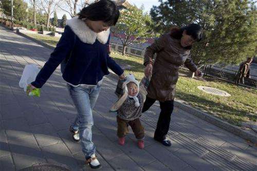 China: Birth limits still needed despite easing