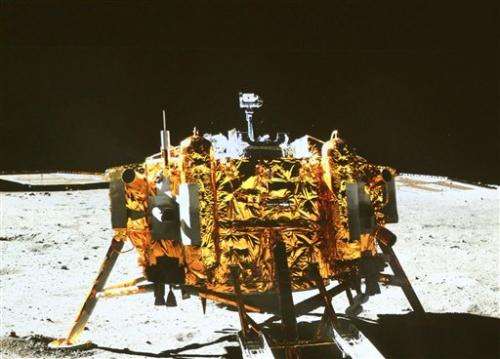 China's flag-bearing rover photographed on moon