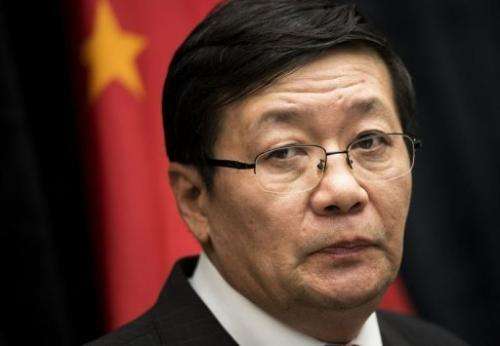 Chinese Minister of Finance Lou Jiwei gives a briefing at the US Department of the Treasury July 11, 2013 in Washington