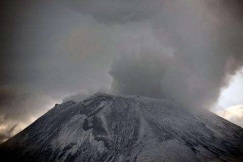Clouds of ash and smoke are spewed from the Popocatepetl Volcano, in Puebla, Mexico, on May 13, 2013