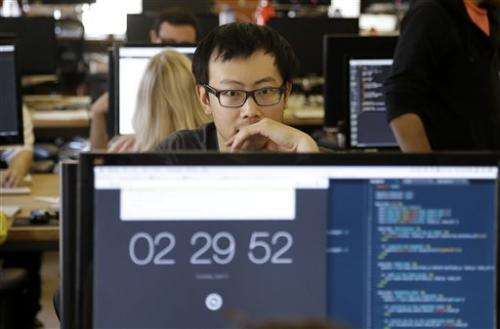 Coding boot camps promise to launch tech careers