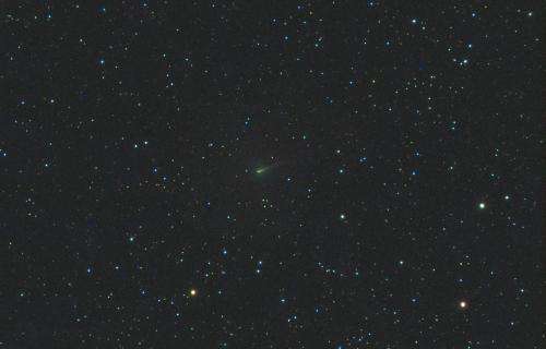 Comet ISON goes green