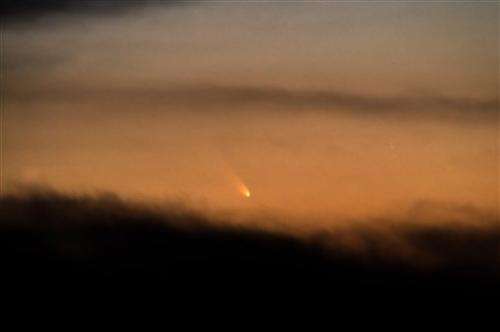 Comet posing beside crescent moon in cool photo op