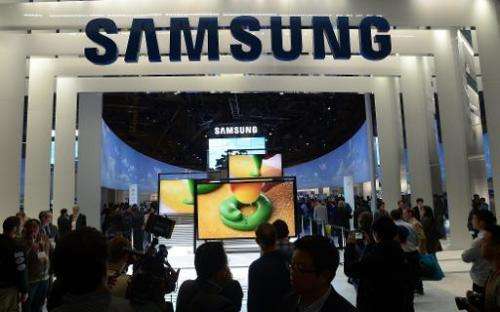Consumers check products at Samsung booth at the 2013 International CES at the Las Vegas Convention Center on January 10, 2013