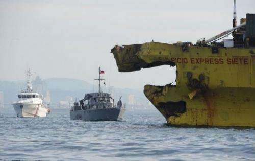 Damaged cargo ship seen on August 17, 2013 after it collided with the ferry St. Thomas Aquinas