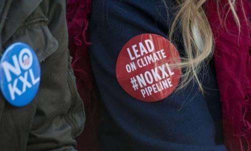 Daryl Hannah wears a sticker as she protests against Keystone XL Pipeline on February 13, 2013 in Washington, DC